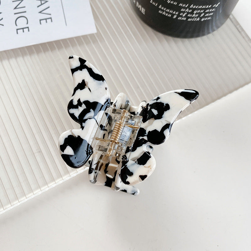 Wholesale Cow Black and White Medium Hollow Acetate Plate Hair Clips
